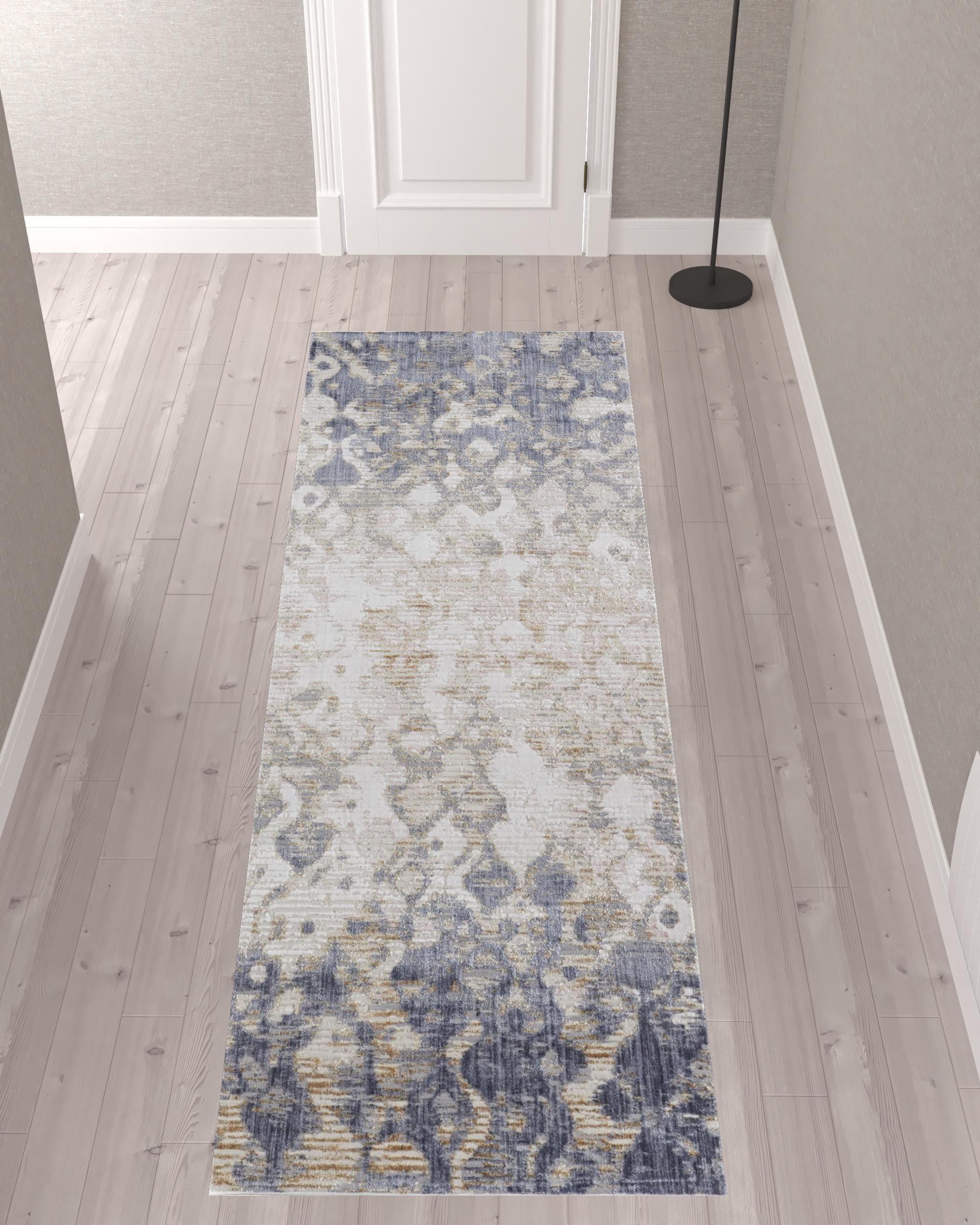 10' Tan Ivory And Blue Abstract Power Loom Distressed Runner Rug