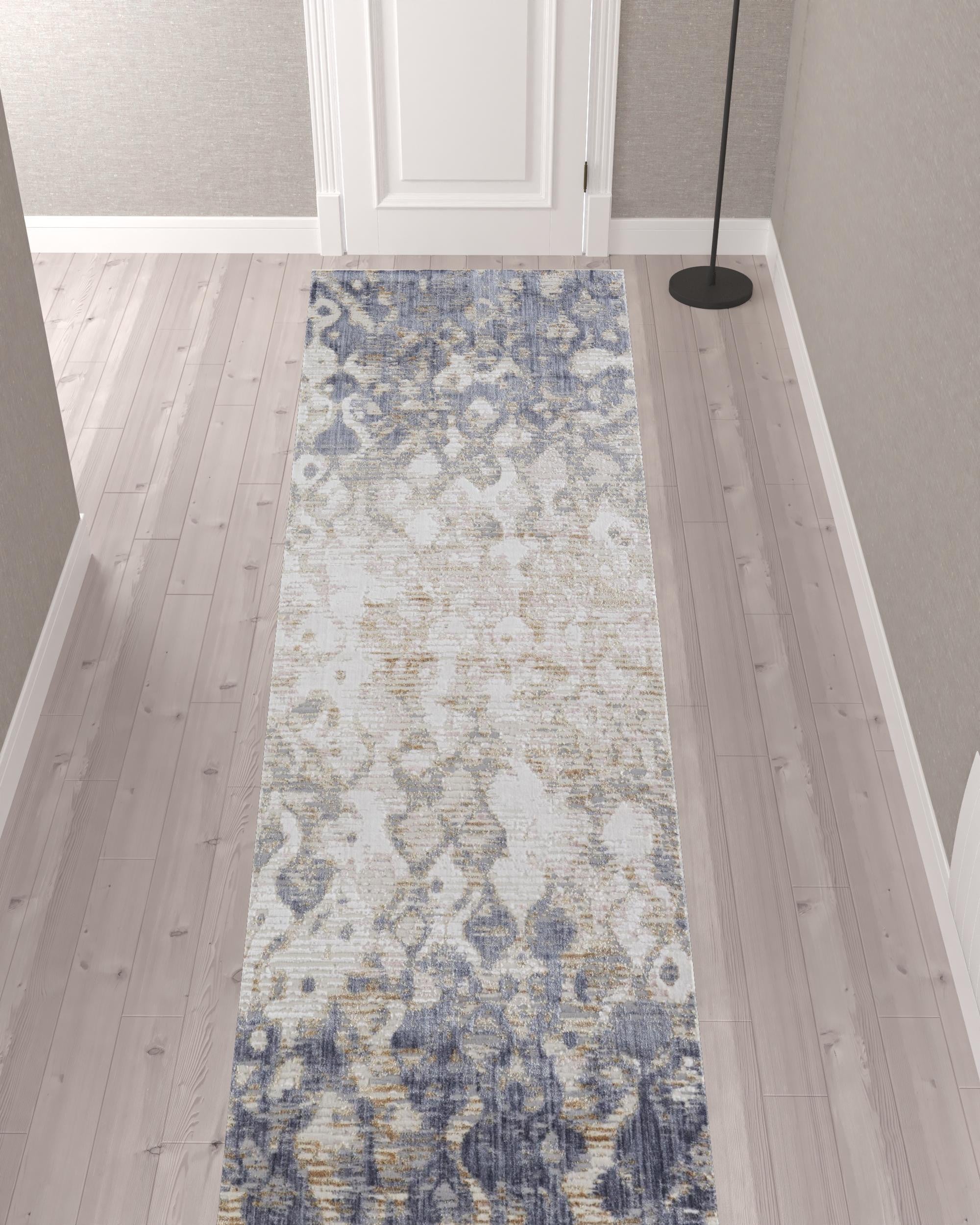 12' Tan Ivory And Blue Abstract Power Loom Distressed Runner Rug