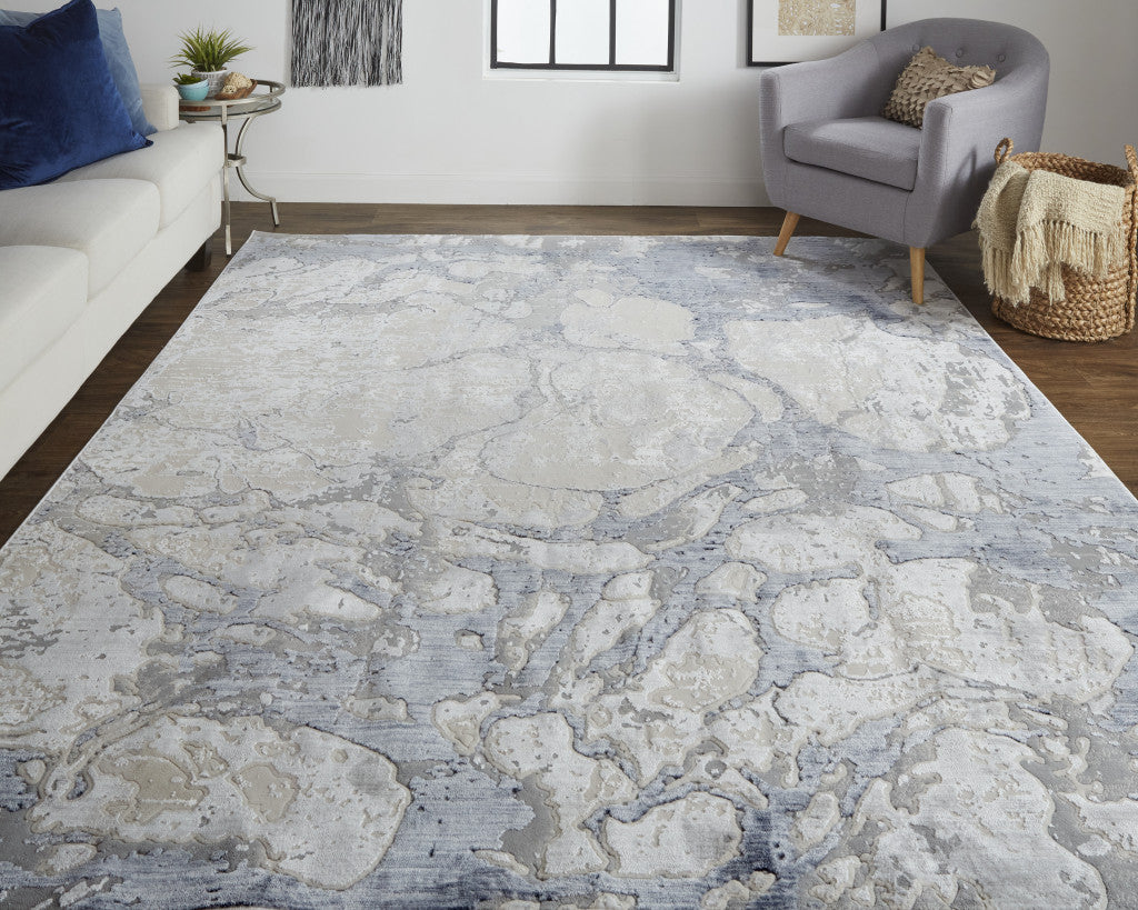 4' X 6' Ivory And Blue Abstract Power Loom Distressed Area Rug