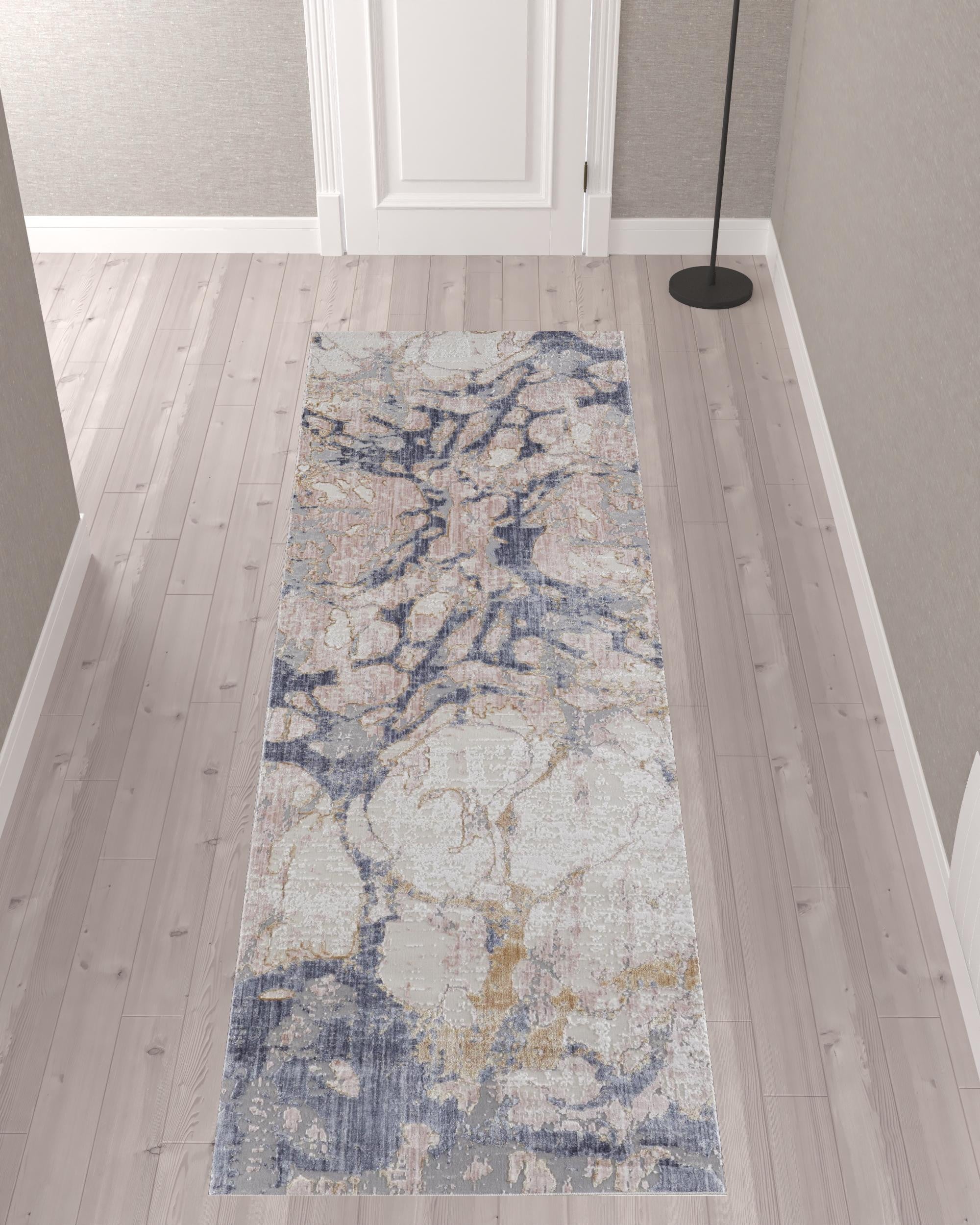 10' Tan And Blue Abstract Power Loom Distressed Runner Rug