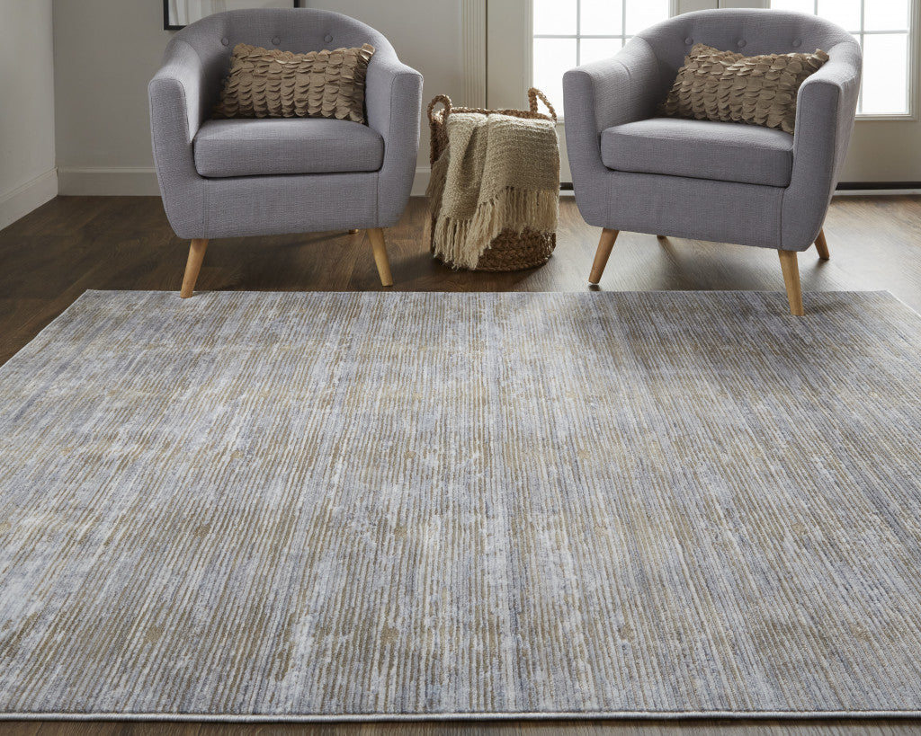 5' X 8' Taupe Silver And Tan Abstract Power Loom Area Rug