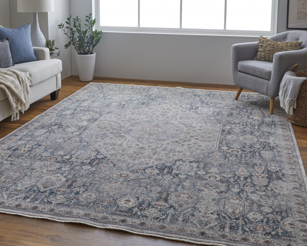 7' X 10' Blue And Ivory Floral Power Loom Stain Resistant Area Rug