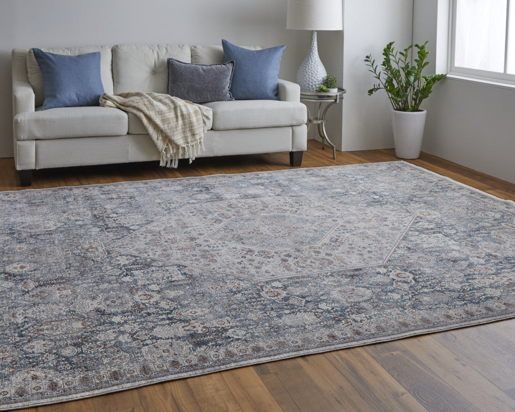 7' X 10' Blue And Ivory Floral Power Loom Stain Resistant Area Rug