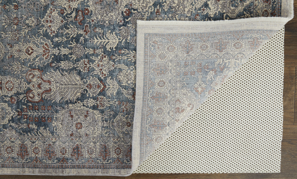 7' X 10' Blue And Ivory Floral Power Loom Stain Resistant Area Rug