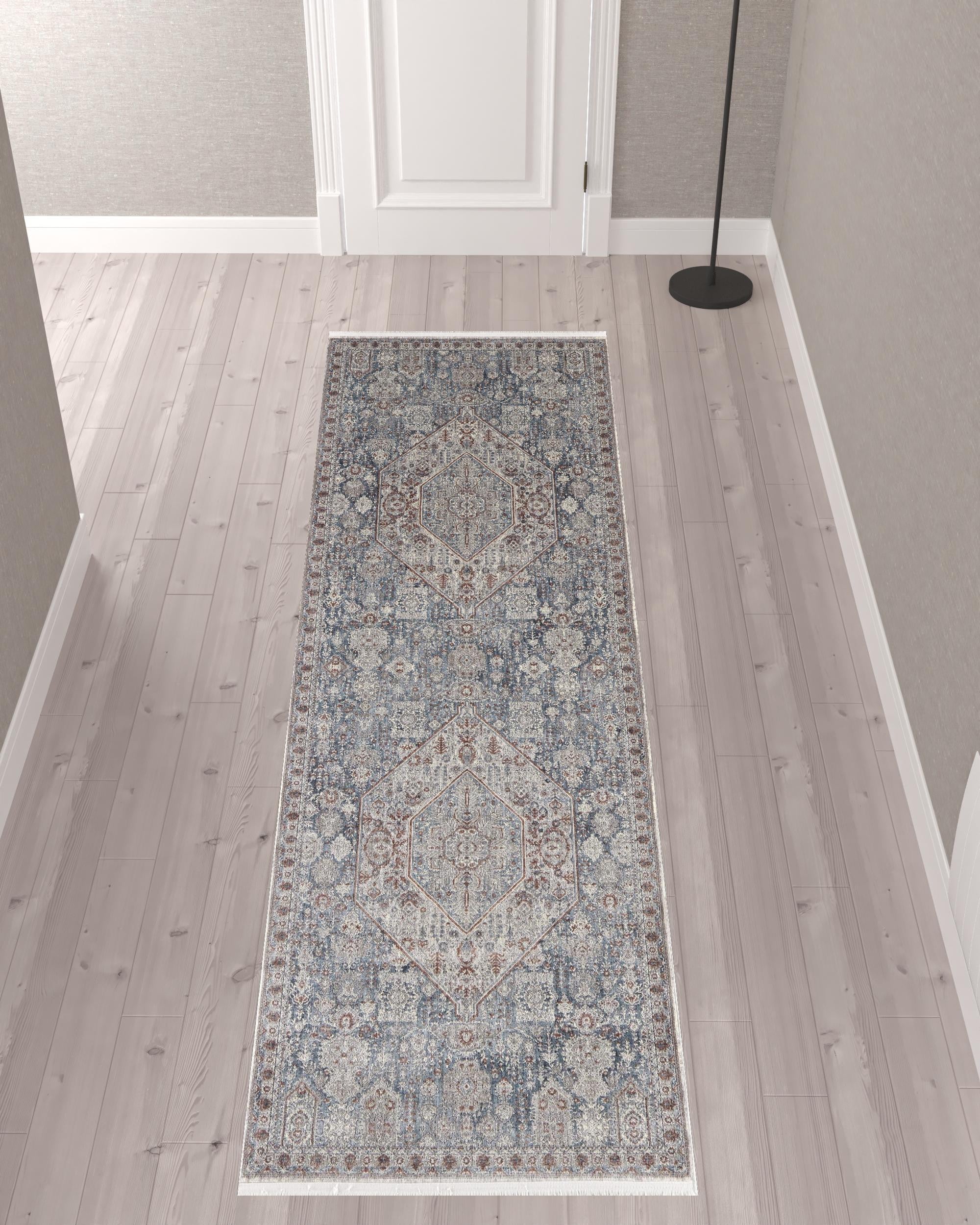 10' Blue And Ivory Floral Power Loom Stain Resistant Runner Rug