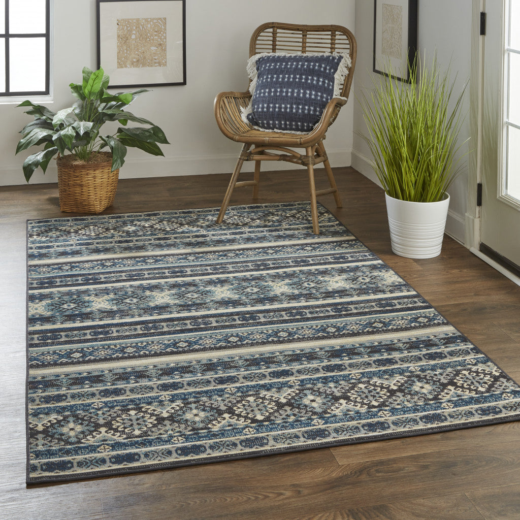 7' X 10' Blue Tan And Black Geometric Power Loom Distressed Stain Resistant Area Rug