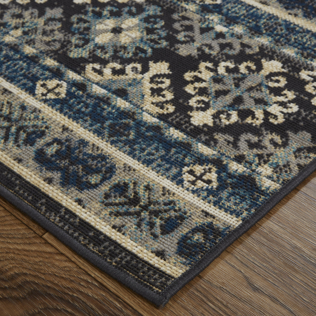 7' X 10' Blue Tan And Black Geometric Power Loom Distressed Stain Resistant Area Rug