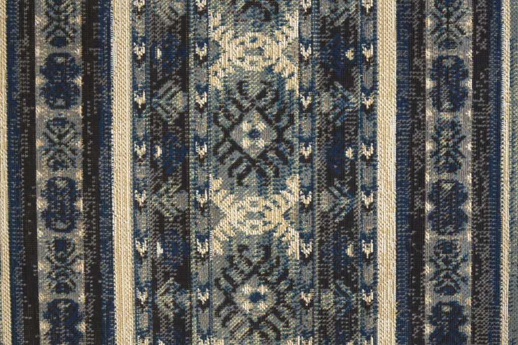 7' X 10' Blue Tan And Black Geometric Power Loom Distressed Stain Resistant Area Rug