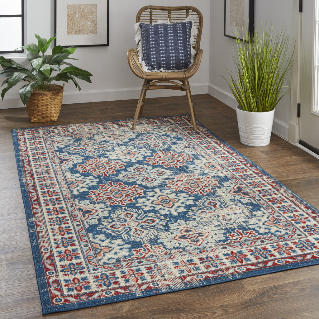 7' X 10' Blue Red And Ivory Abstract Power Loom Distressed Stain Resistant Area Rug