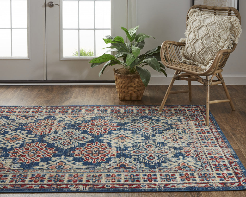 7' X 10' Blue Red And Ivory Abstract Power Loom Distressed Stain Resistant Area Rug