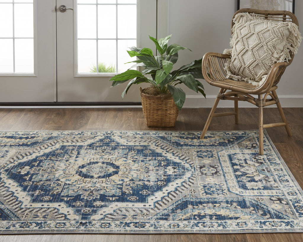 8' X 11' Blue And Ivory Abstract Power Loom Distressed Stain Resistant Area Rug