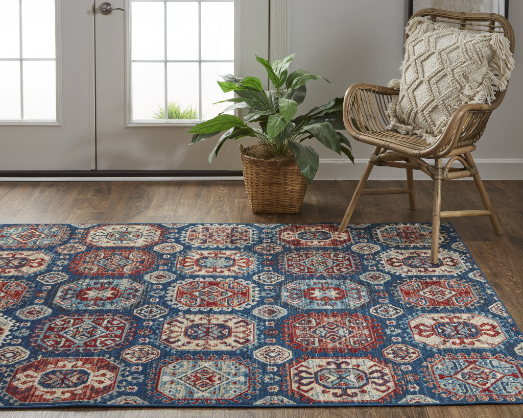 8' X 11' Blue Red And Tan Abstract Power Loom Distressed Stain Resistant Area Rug