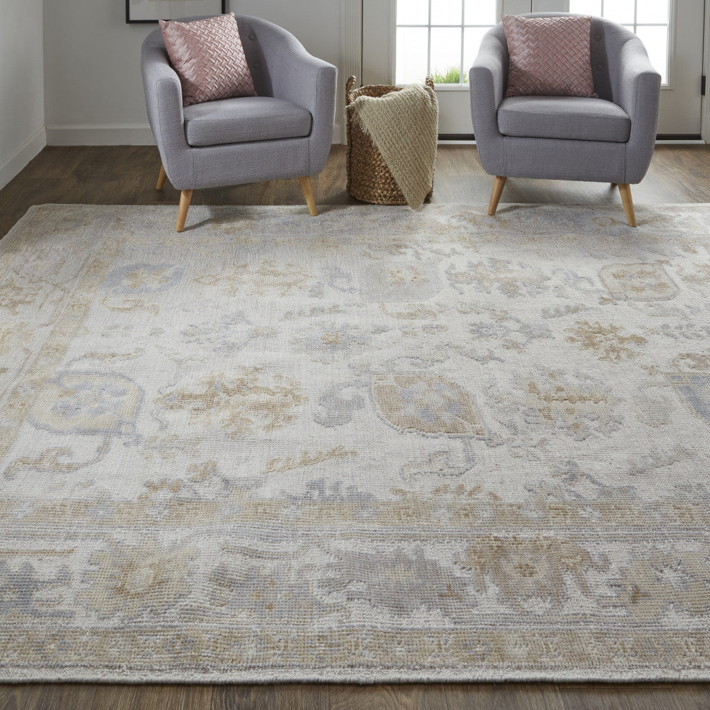 4' X 6' Ivory And Tan Floral Hand Knotted Stain Resistant Area Rug