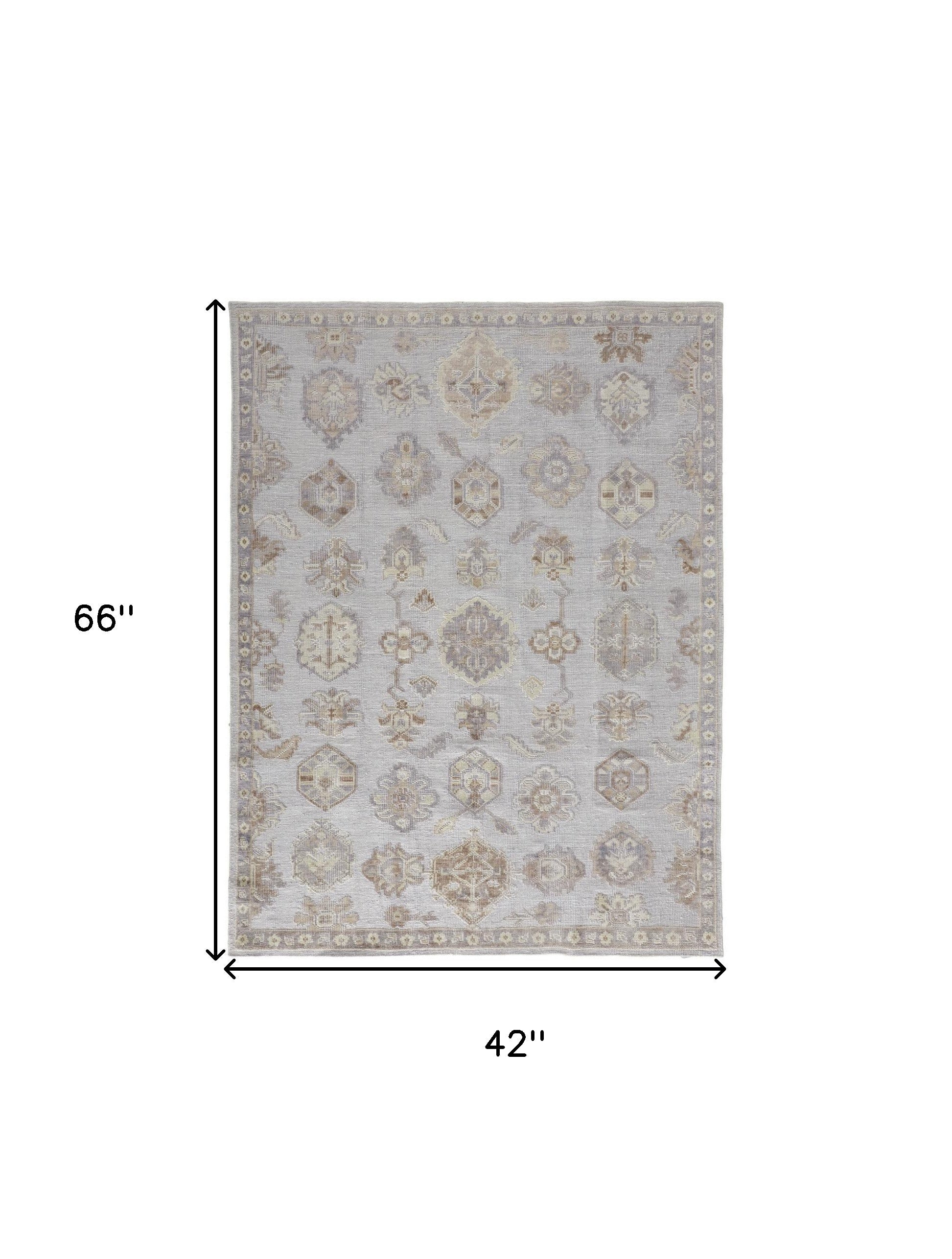 4' X 6' Ivory Silver And Tan Floral Hand Knotted Stain Resistant Area Rug