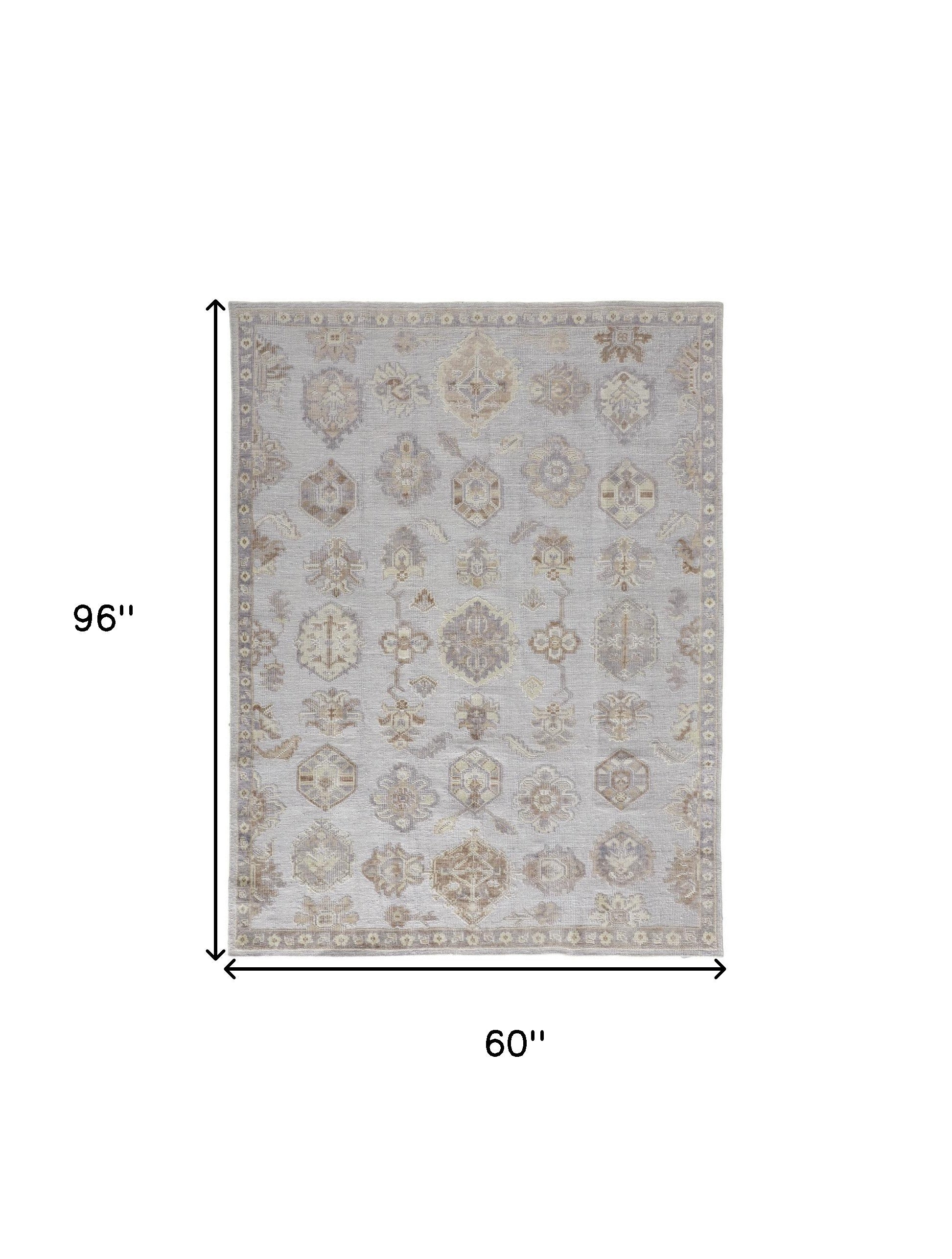 5' X 8' Ivory Silver And Tan Floral Hand Knotted Stain Resistant Area Rug