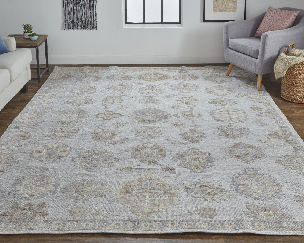 5' X 8' Ivory Silver And Tan Floral Hand Knotted Stain Resistant Area Rug