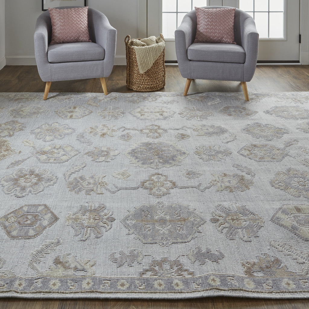 5' X 8' Ivory Silver And Tan Floral Hand Knotted Stain Resistant Area Rug