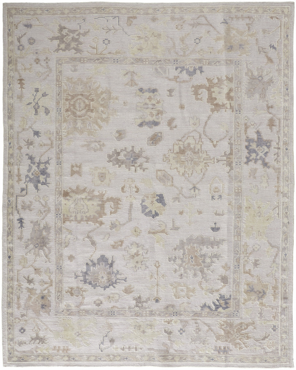 5' X 8' Tan Ivory And Orange Floral Hand Knotted Stain Resistant Area Rug