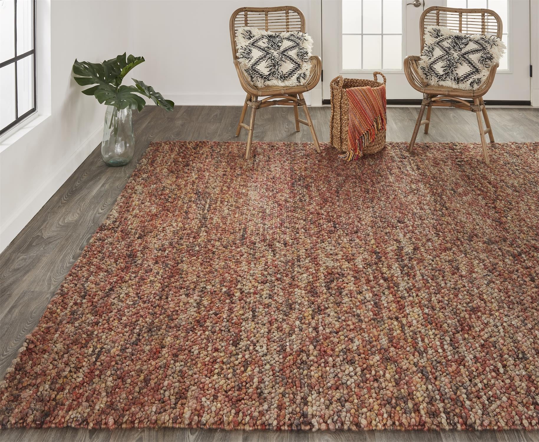 5' X 8' Brown Orange And Red Wool Hand Woven Distressed Stain Resistant Area Rug