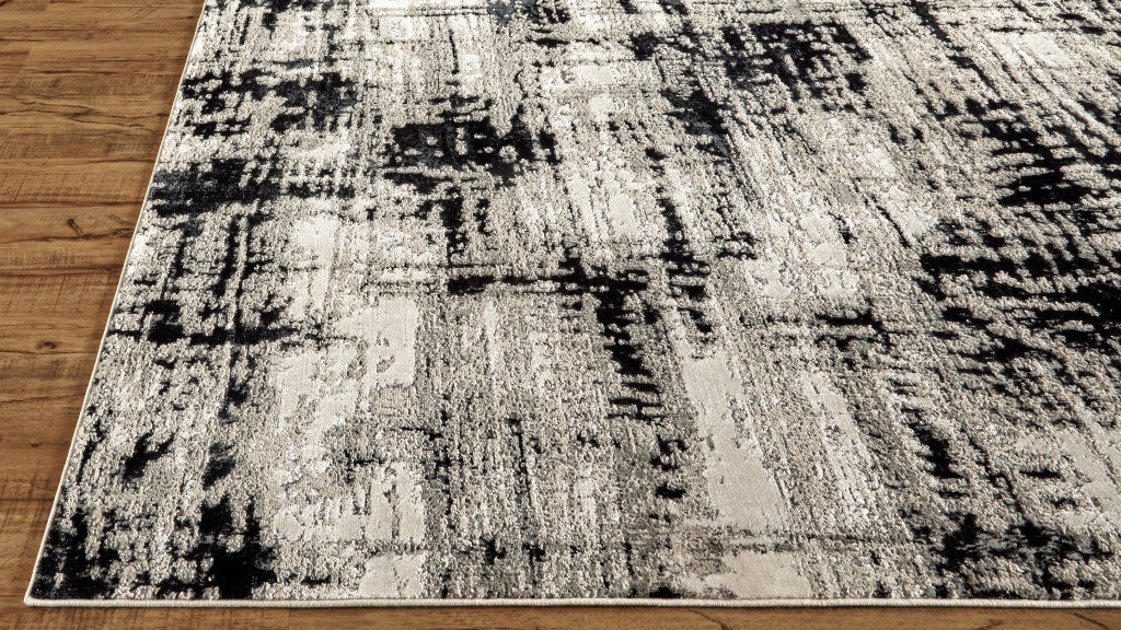 7' X 10' Black White And Gray Stain Resistant Area Rug