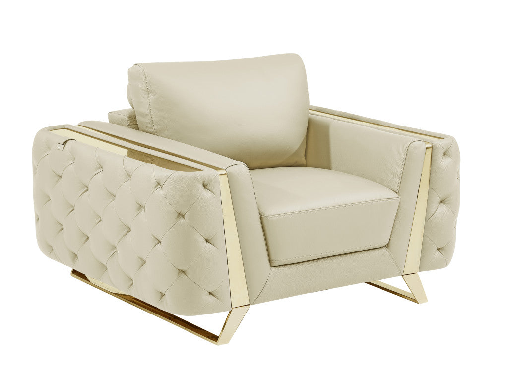 50" Beige and Silver Faux Leather Tufted Arm Chair