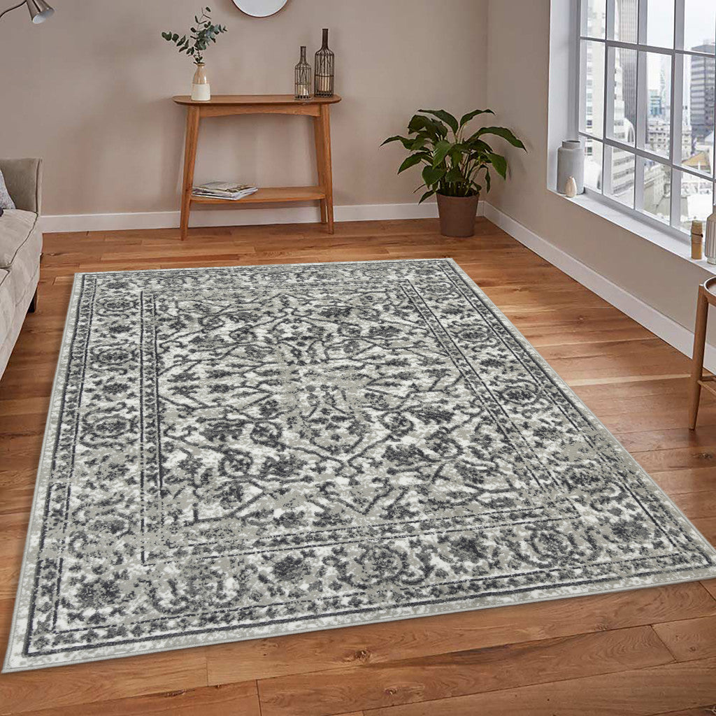 9' x 12' Gray Floral Power Loom Area Rug With Fringe