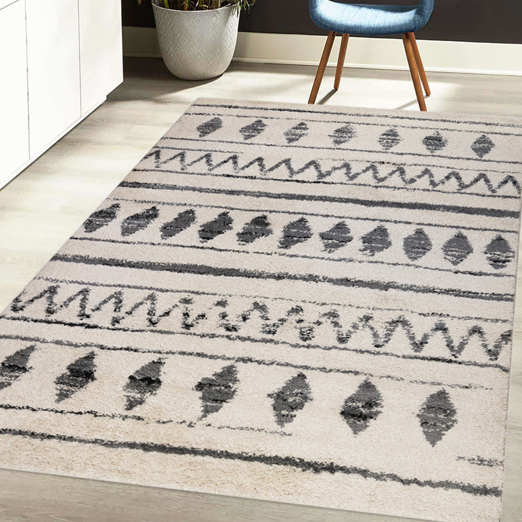 7' x 9' Ivory and Black Geometric Shag Area Rug