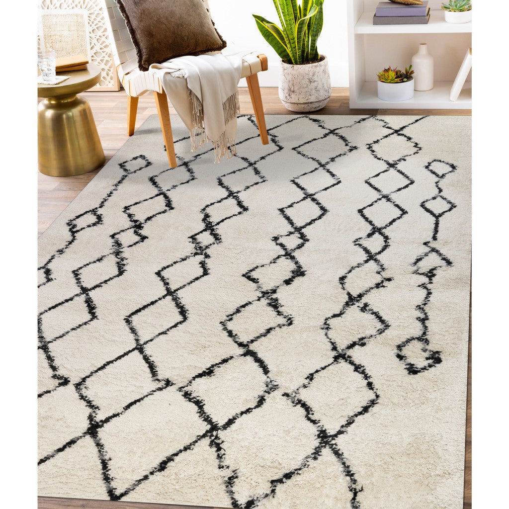 7' x 9' Gray and Ivory Geometric Shag Area Rug